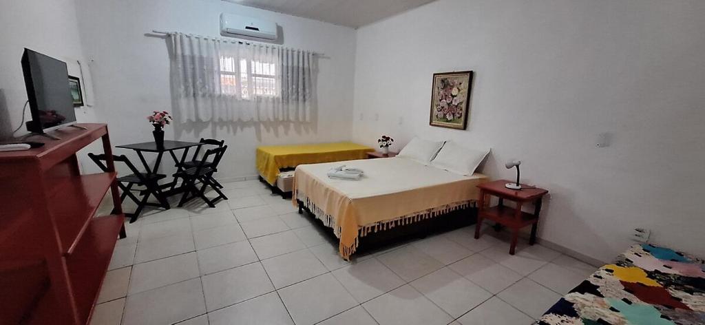 Postel nebo postele na pokoji v ubytování SCR-Saquarema-Loft Rosa Vermelha