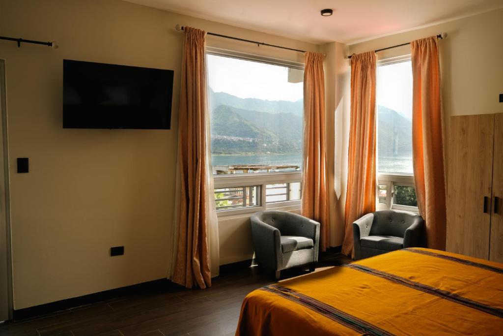 Giường trong phòng chung tại Casa Lolita's