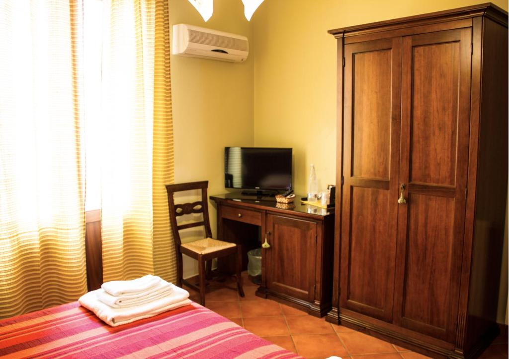 Łóżko lub łóżka w pokoju w obiekcie B&B Porta Bagni