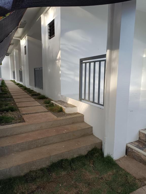 a set of stairs leading up to a building at M and A Guesthouse in San Juan