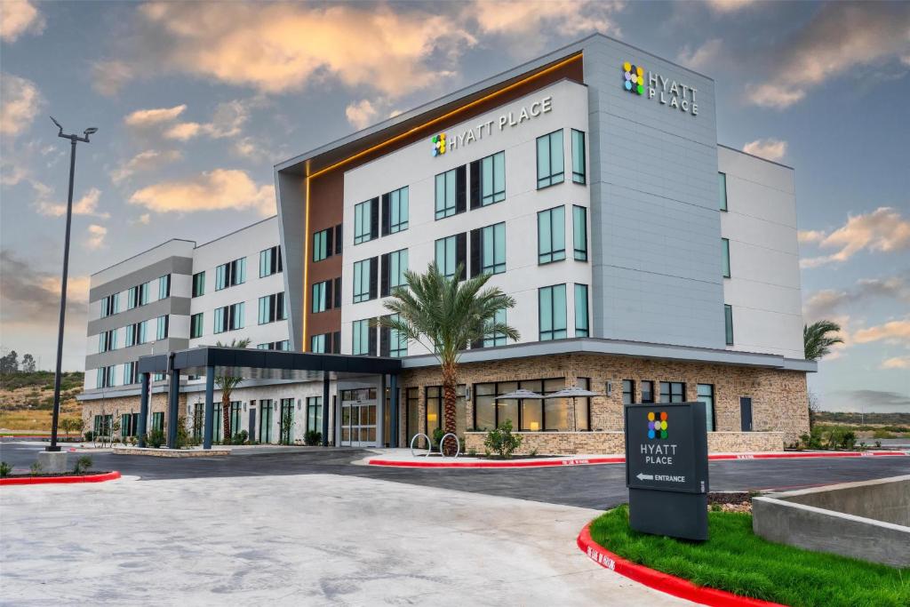 a rendering of a hotel with a building at Hyatt Place Eagle Pass in Eagle Pass