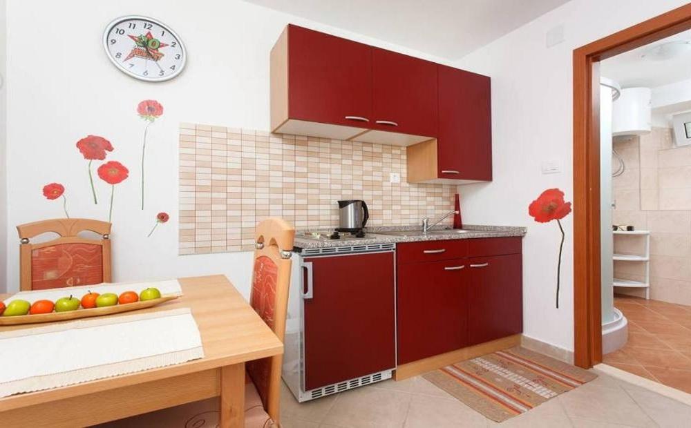 Kuchyň nebo kuchyňský kout v ubytování Apartments Mali Raj