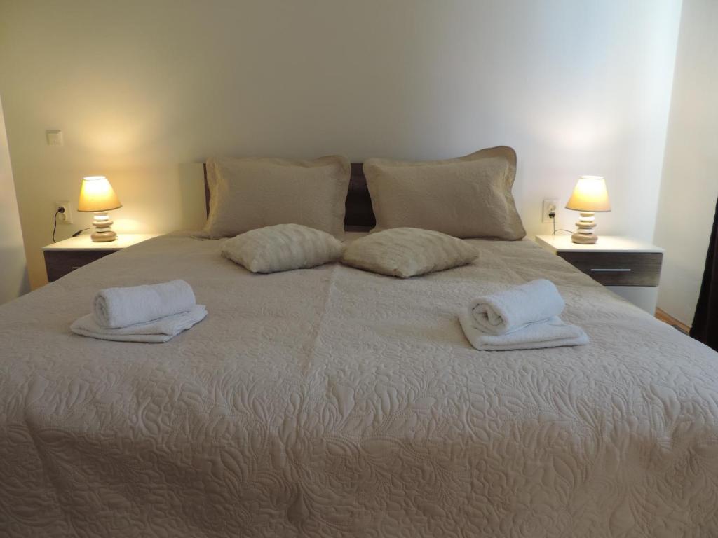 Posteľ alebo postele v izbe v ubytovaní Plitvice Diamond Apartment