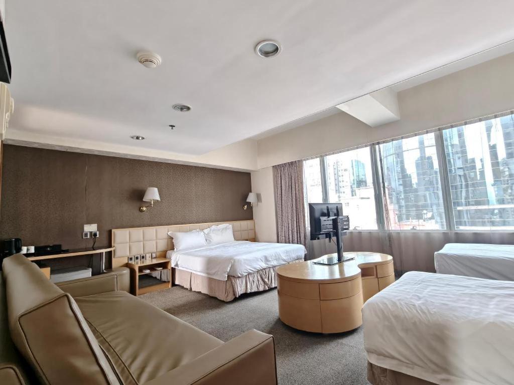 Una cama o camas en una habitación de H1 Hotel