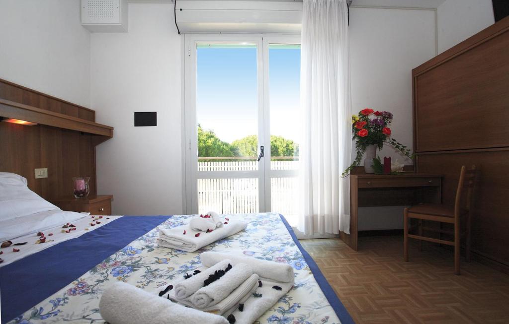 Postel nebo postele na pokoji v ubytování Hotel Aspe