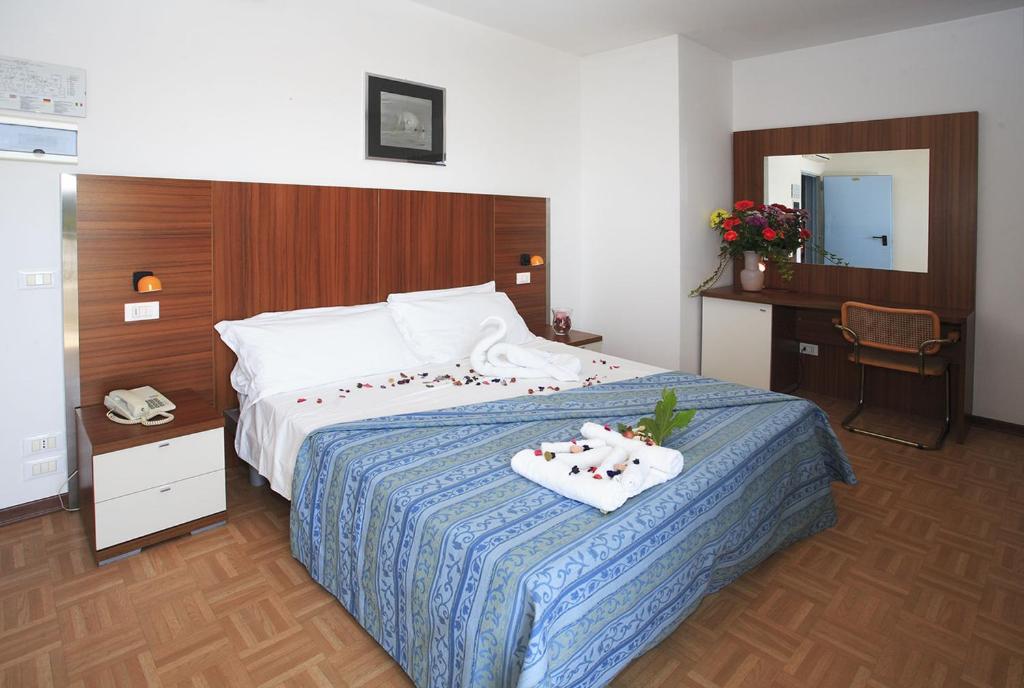 Postel nebo postele na pokoji v ubytování Hotel Aspe