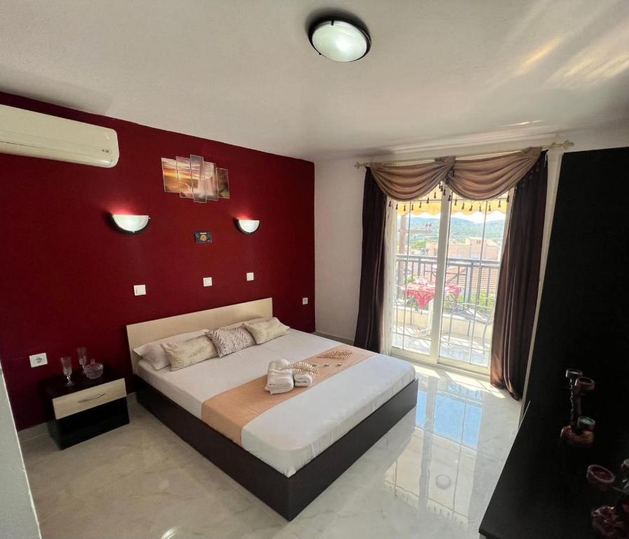 Postel nebo postele na pokoji v ubytování Katerina Studios