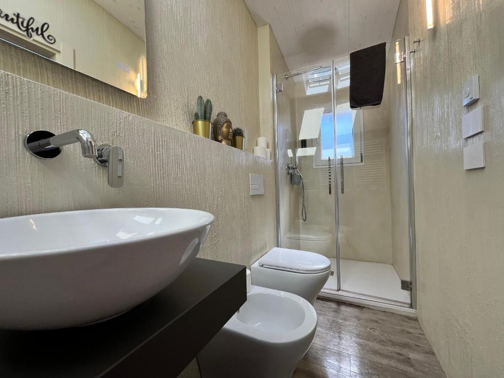 Camere e attico al mare - Habitación Triple