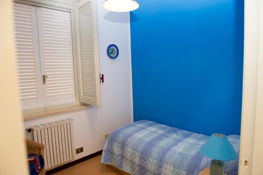 Postel nebo postele na pokoji v ubytování Lomarchi Holiday Home