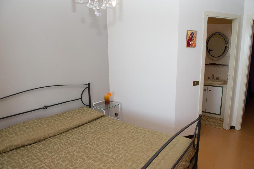 Postel nebo postele na pokoji v ubytování Lomarchi Holiday Home