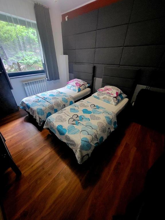 Postel nebo postele na pokoji v ubytování M Hostel
