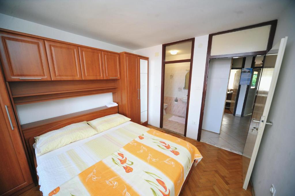 Postel nebo postele na pokoji v ubytování Rooms Novaković