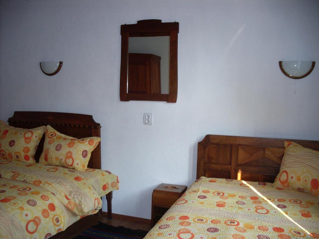 Postel nebo postele na pokoji v ubytování Tsutsovi House