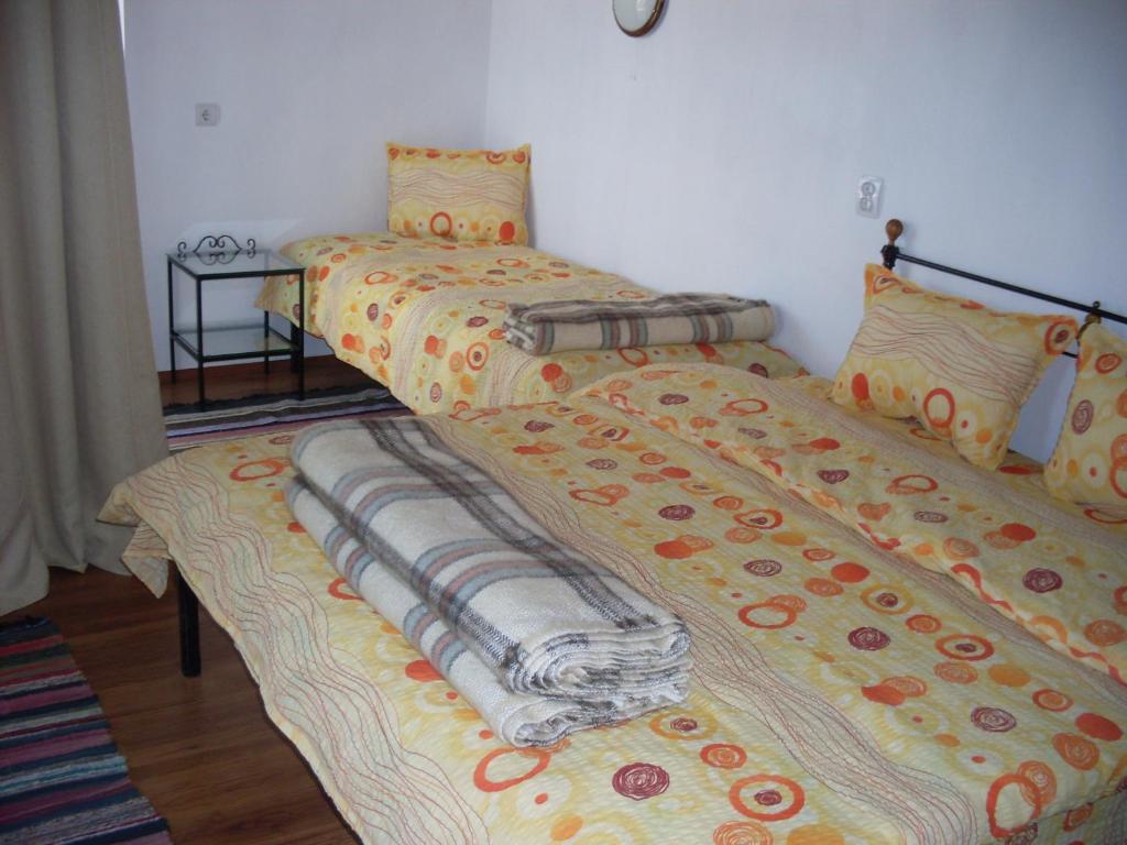 Postel nebo postele na pokoji v ubytování Tsutsovi House