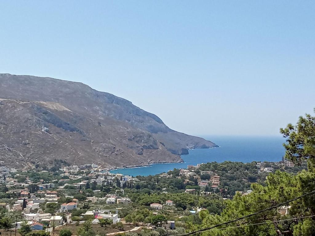 a view of a city and a body of water at Fantasia Villas Deluxe "Selene" in Panormos Kalymnos