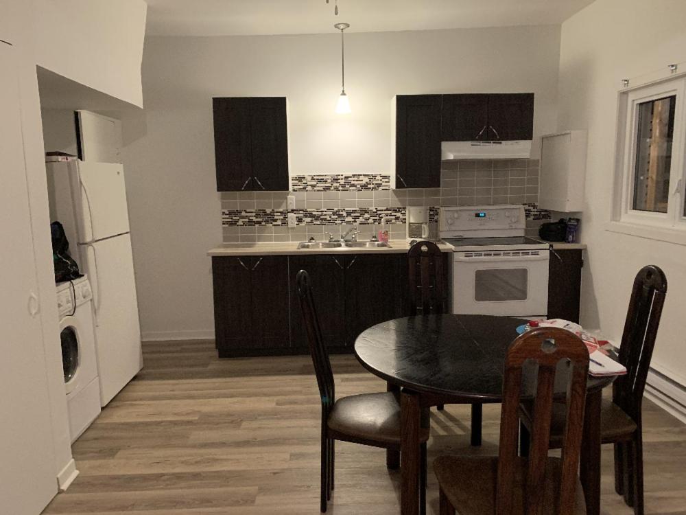 Kuchyň nebo kuchyňský kout v ubytování Grand Logement Chaleureux