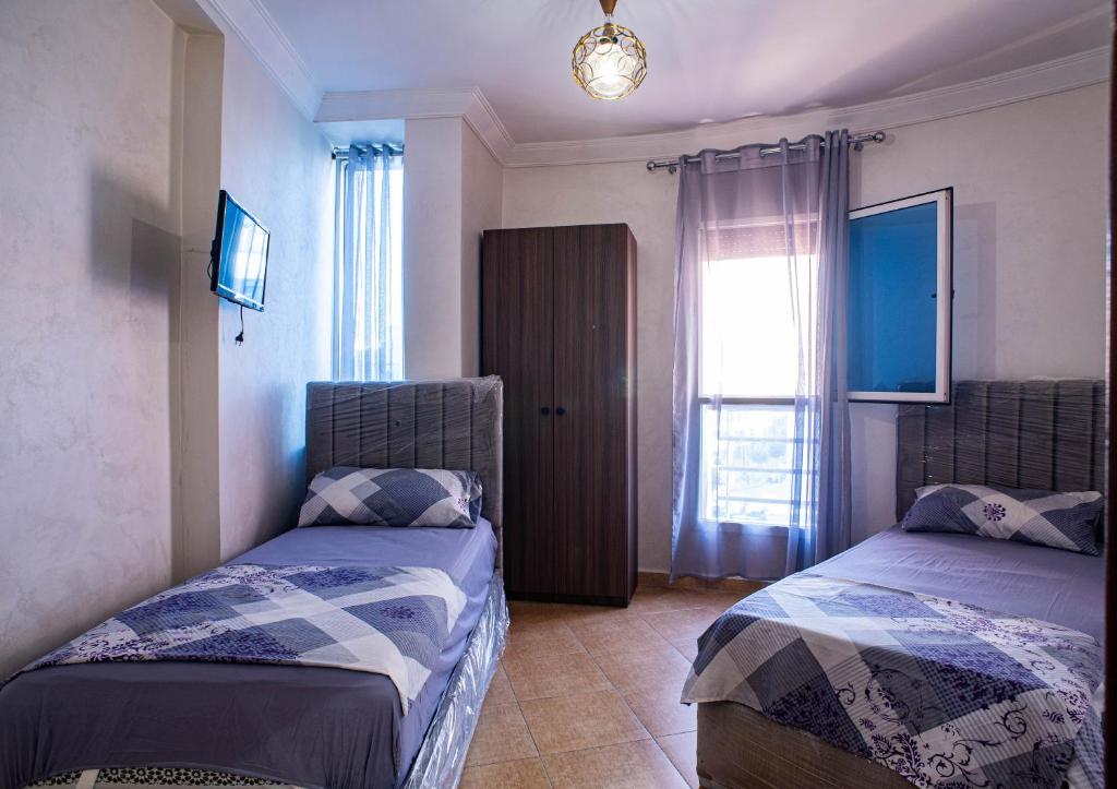 Ένα ή περισσότερα κρεβάτια σε δωμάτιο στο Luxury Apartment with Moroccan Elegance in Branes