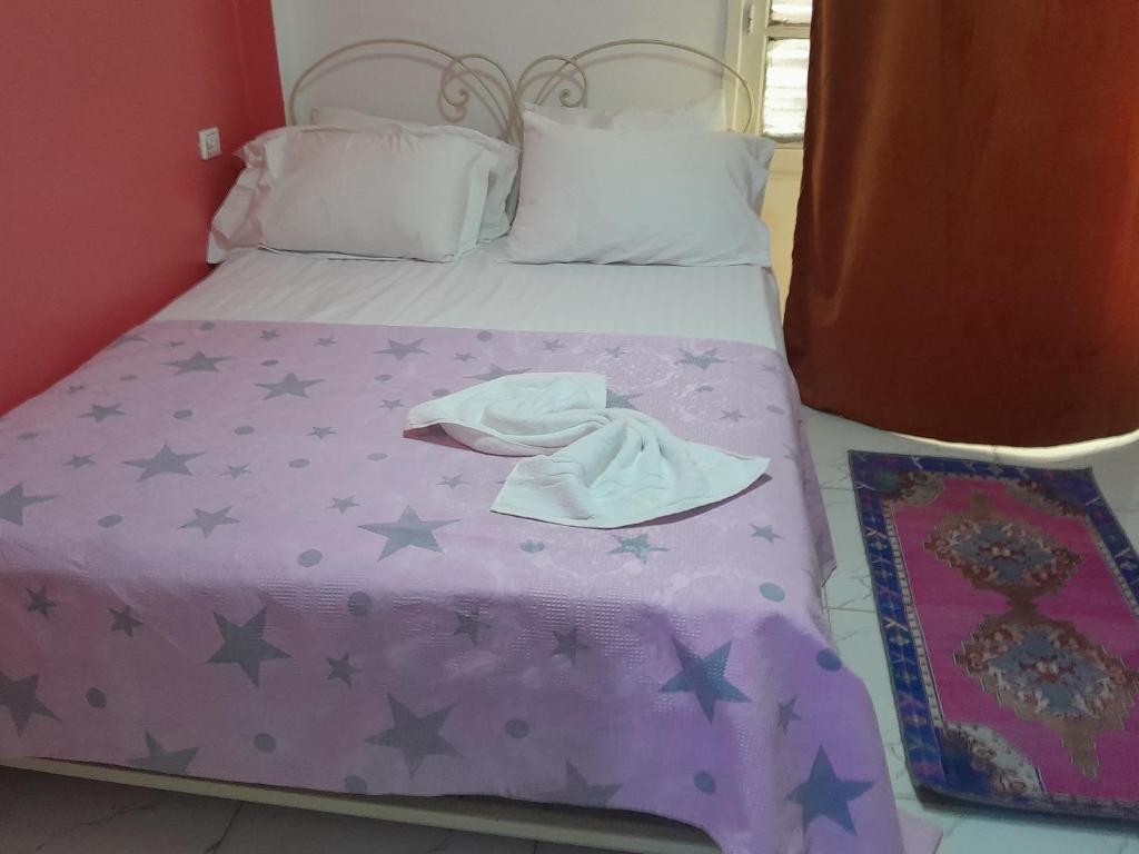 Ένα ή περισσότερα κρεβάτια σε δωμάτιο στο yaso apartment