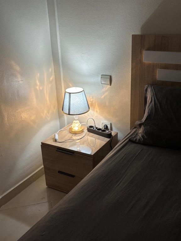 Ένα ή περισσότερα κρεβάτια σε δωμάτιο στο Hassan Apartment - Ideal for Riders, Free Garage Parking Included