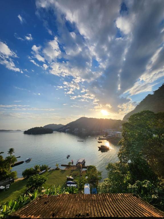 a view of a river with boats in the water at Suite La Bela Vista in Angra dos Reis