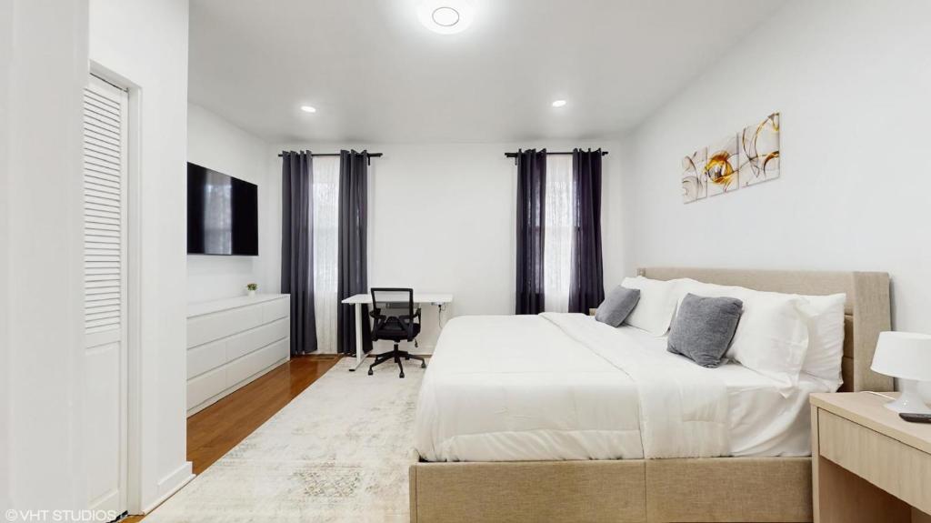 Ένα ή περισσότερα κρεβάτια σε δωμάτιο στο Menod Luxury Apartment