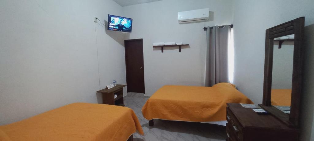 Μια τηλεόραση ή/και κέντρο ψυχαγωγίας στο El hotel más céntrico de Cd Valles con estacion de autobuses a media cuadra que te llevara a toda la huasteca