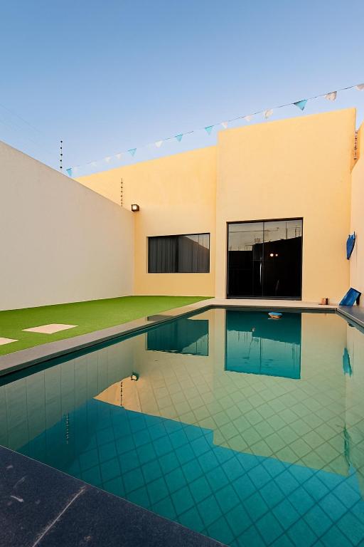 Bazén v ubytování Casa Ampla com Piscina e Área de Churrasco 400A nebo v jeho okolí