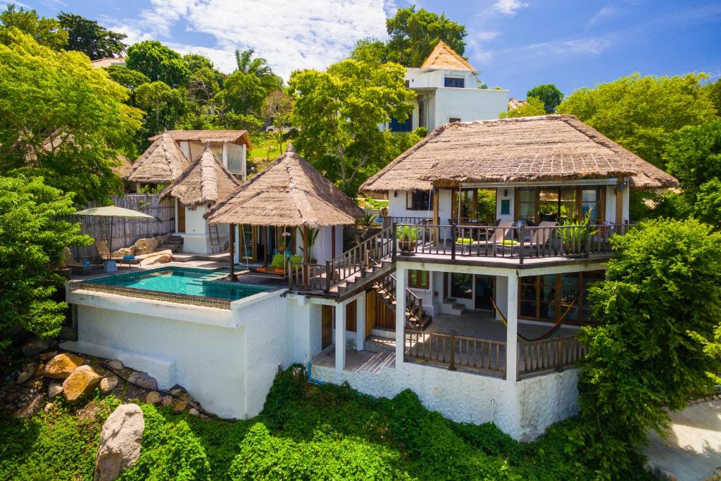 an aerial view of a house with a swimming pool at The Fisherman's Villas in Koh Tao