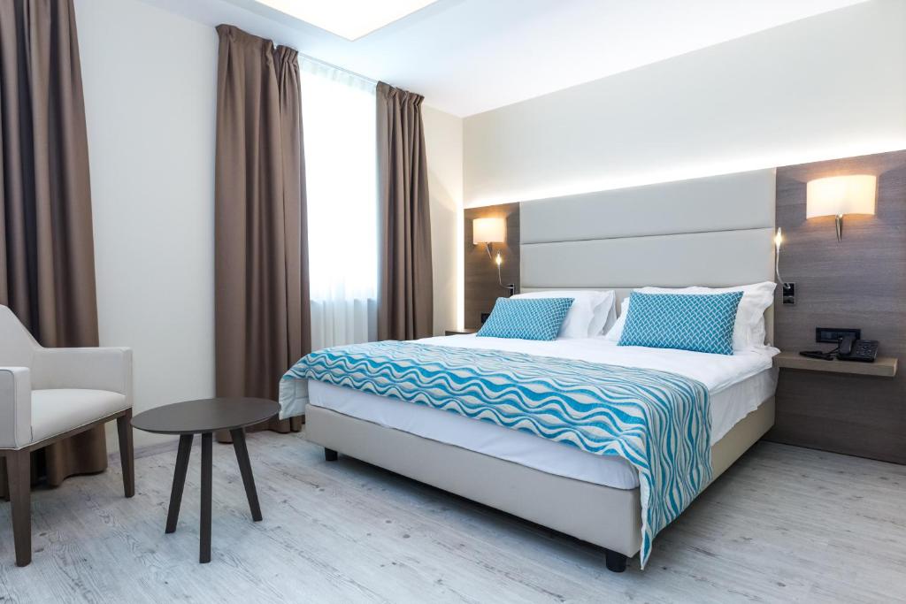 Postel nebo postele na pokoji v ubytování Hotel Petrčane