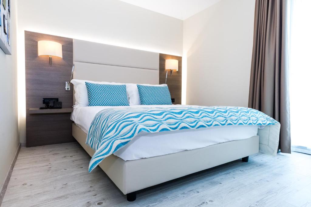 Postel nebo postele na pokoji v ubytování Hotel Petrčane