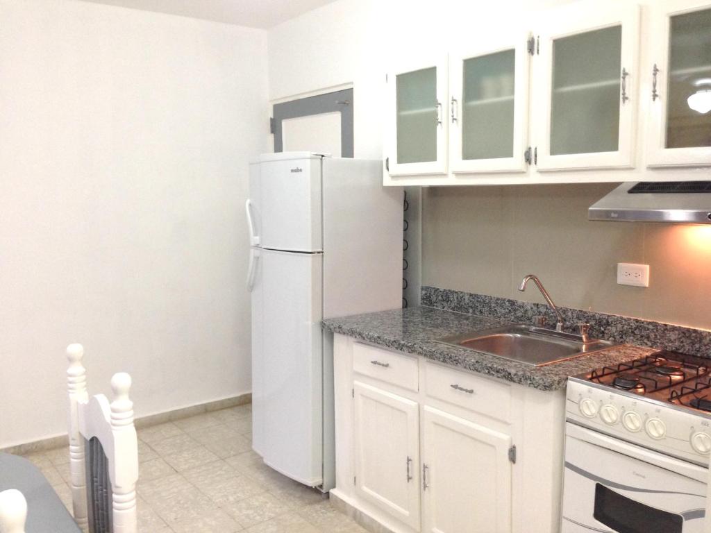 Kuchyň nebo kuchyňský kout v ubytování Cita del Sol City Apartments