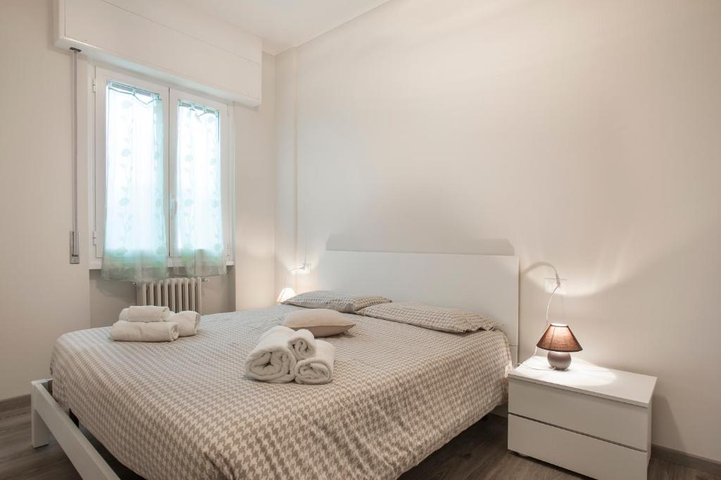 Postel nebo postele na pokoji v ubytování B&B Panorama Iseo