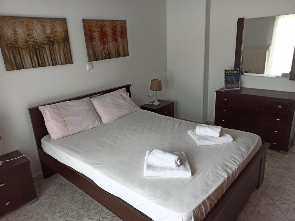 Postel nebo postele na pokoji v ubytování JULIS House