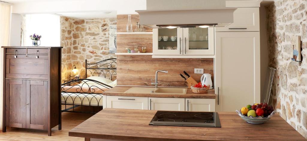Kuchyň nebo kuchyňský kout v ubytování Apartment Dane