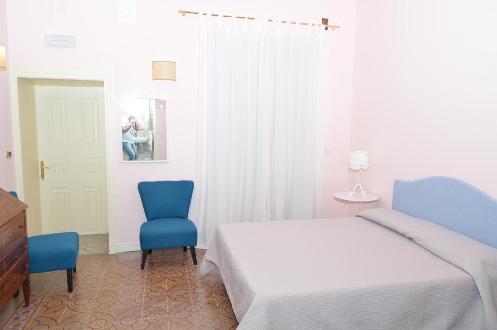 Postel nebo postele na pokoji v ubytování B&B Casa D'alleri