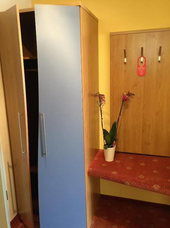 Postel nebo postele na pokoji v ubytování Hotel Ambiente