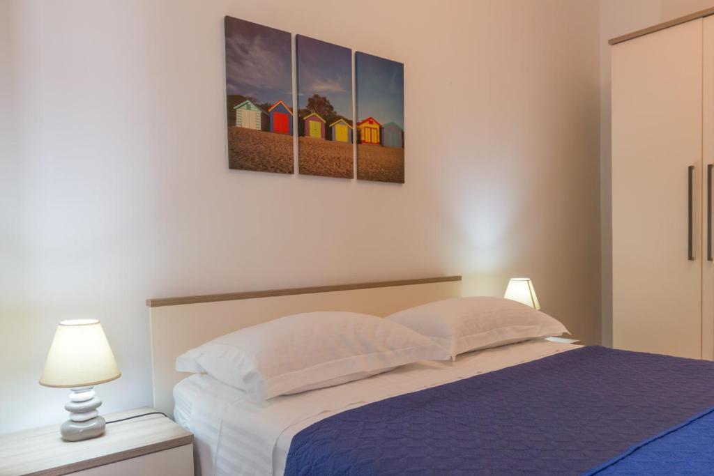 Posteľ alebo postele v izbe v ubytovaní Apartments Svilan