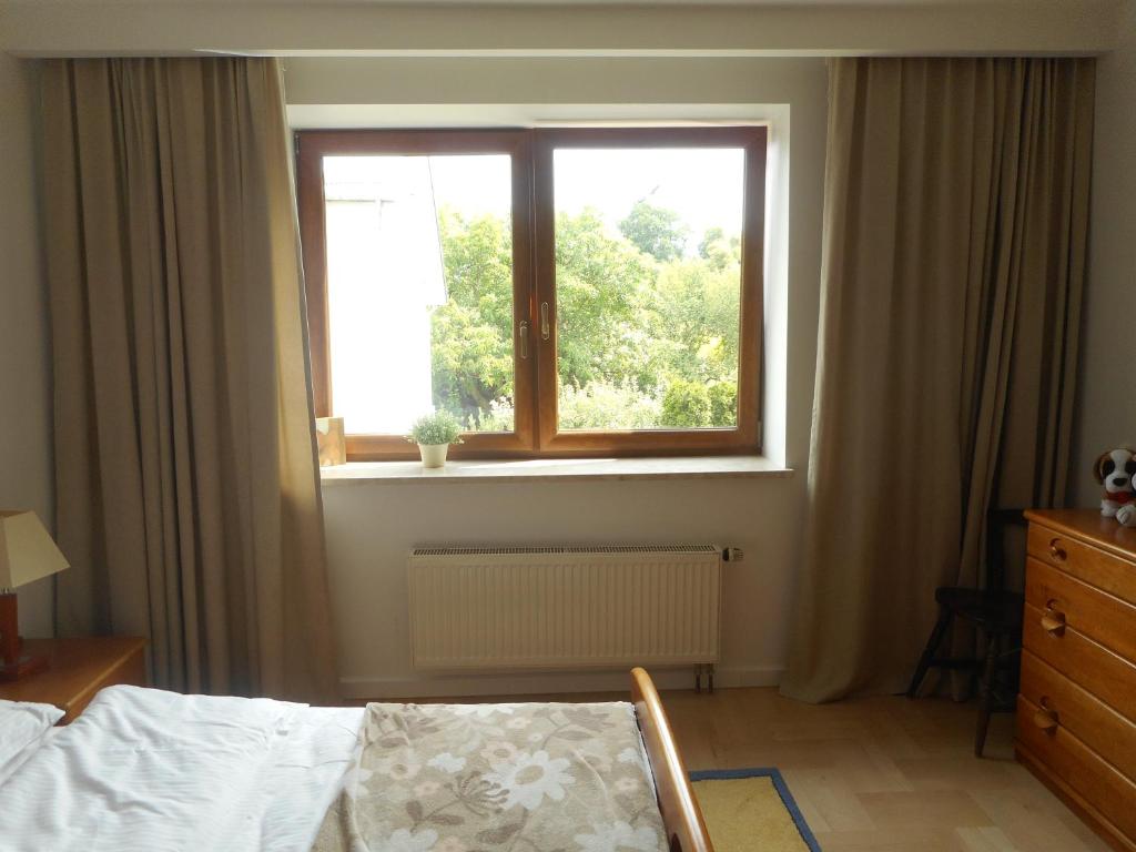 Posteľ alebo postele v izbe v ubytovaní Gdynia Orlowo Honey Apartment
