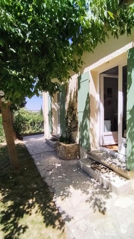 an outside view of a house with a tree at Mes Maisons - Holiday Villa in Drome Provencale - Villa Bellevue Venterol 26110 in Venterol