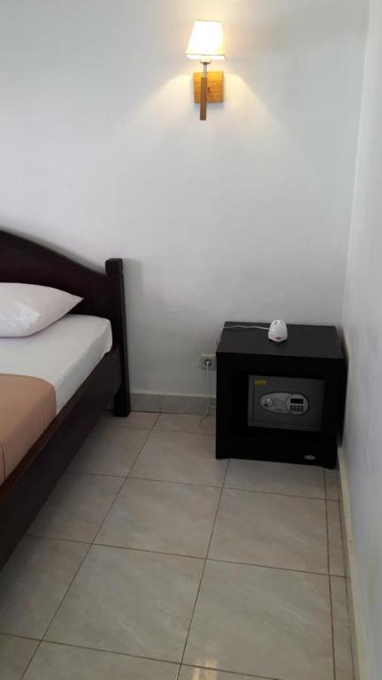 Postel nebo postele na pokoji v ubytování Gili T Heaven