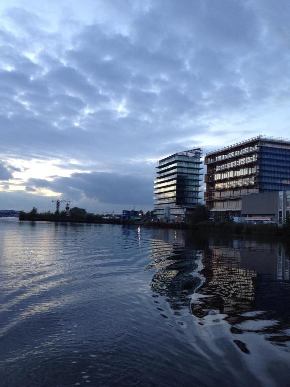 Hotel Black Jack Suites, a large body of water with buildings in the background at Black Jack Suites in Amsterdam