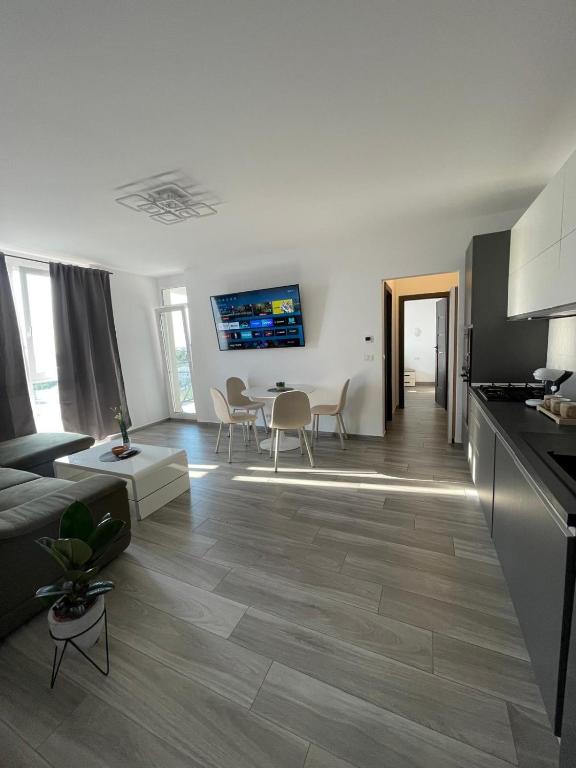 a living room with a couch and a table at CityView Apartment in Arad