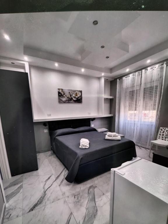 Ένα ή περισσότερα κρεβάτια σε δωμάτιο στο Dolce Relax