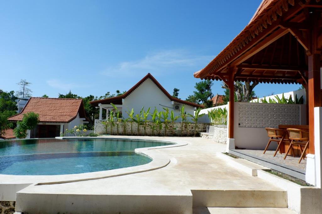an image of a swimming pool in a house at Ginantary Cottages in Uluwatu