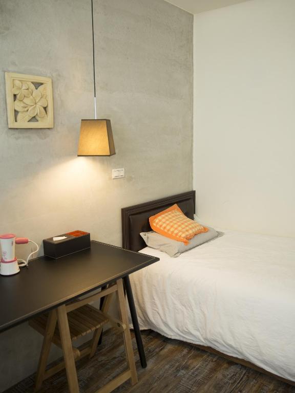 Postel nebo postele na pokoji v ubytování Home & Teak Residence