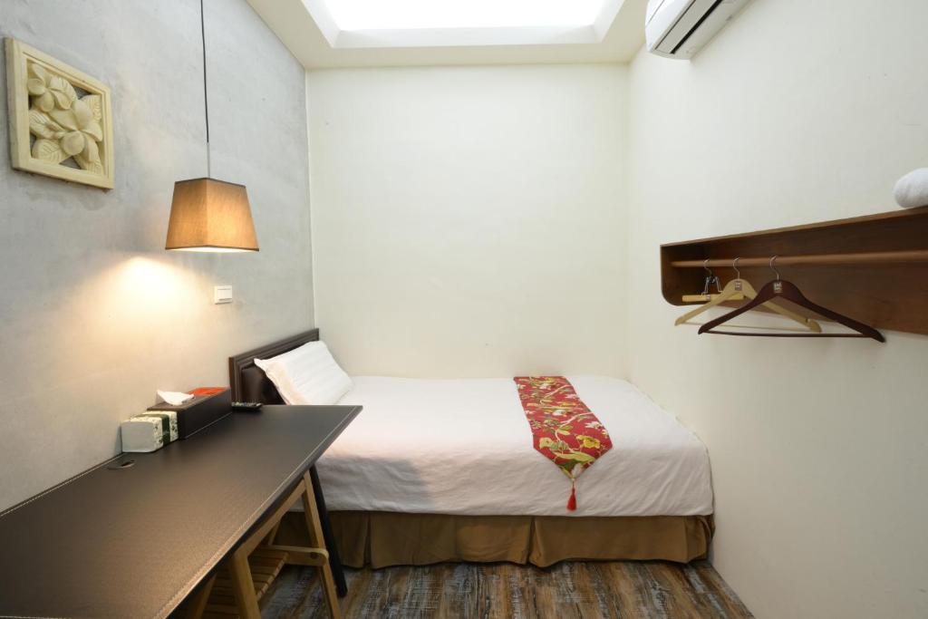 Postel nebo postele na pokoji v ubytování Home & Teak Residence