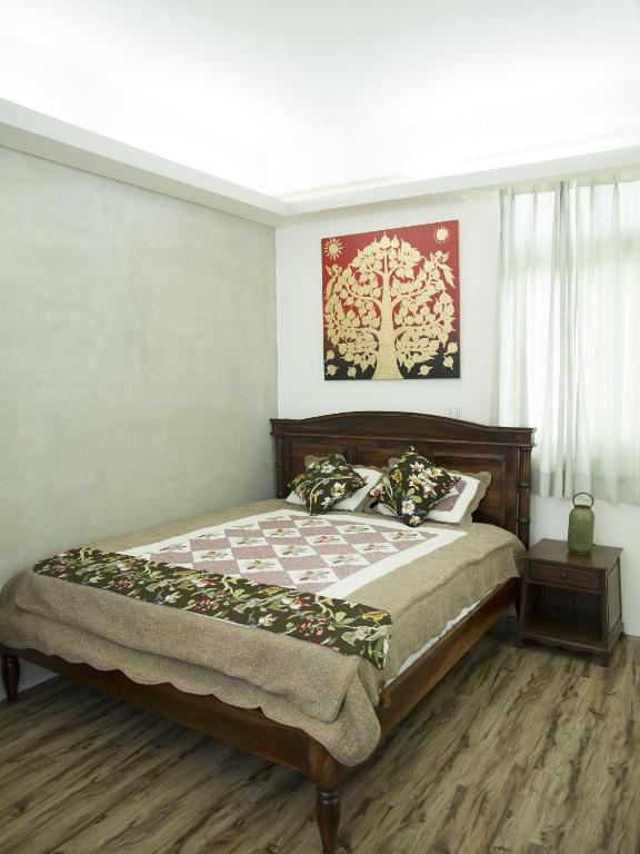Postel nebo postele na pokoji v ubytování Home & Teak Residence