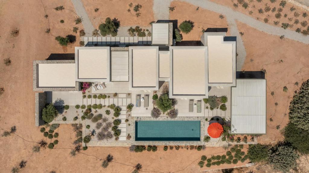 an overhead view of a building with a pool at Ampelas 4BR Villa, Private Pool, To Ktima Paros in Naousa