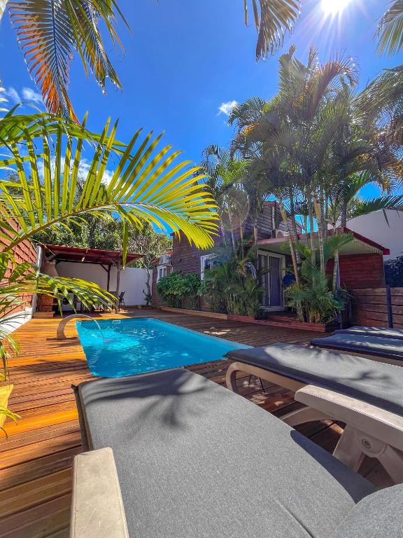 Bassein majutusasutuses Bungalow avec Piscine privée või selle lähedal