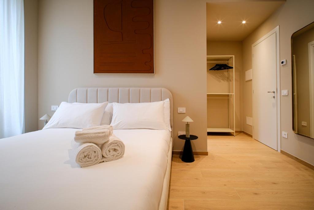 Ένα ή περισσότερα κρεβάτια σε δωμάτιο στο Balcony Studio Double Suite - Bernina Experience